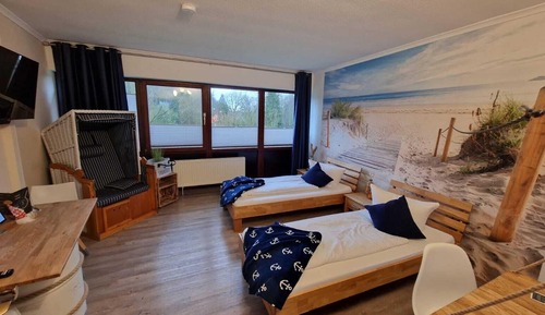 Habitación con 2 camas individuales, vistas al jardín