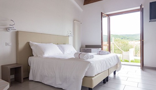 Habitación Deluxe con 1 cama doble o 2 individuales