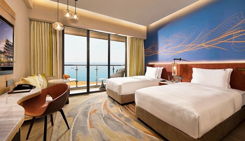Habitación Deluxe, 2 camas individuales, vistas a la playa (Deluxe Twin Ocean View High Floor Roo)