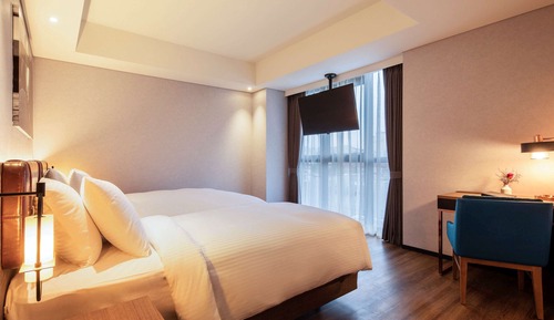 Habitación superior, varias camas