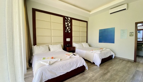 Habitación Premium doble, 2 camas de matrimonio, vistas al jardín