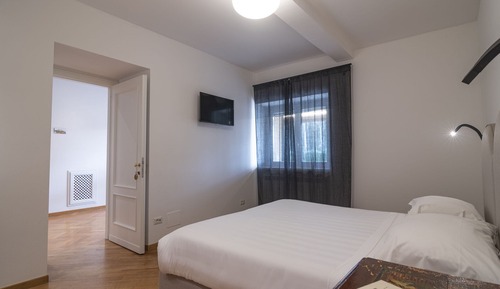 Habitación Confort con 1 cama doble o 2 individuales, baño privado