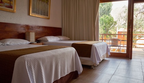 Habitación triple estándar, vistas al jardín