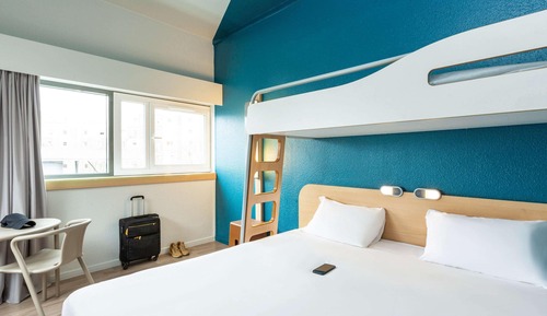Habitación triple, varias camas
