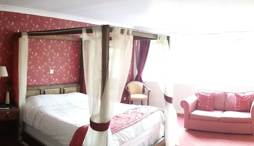 Habitación superior (Four Poster)