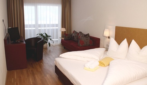 Habitación triple, balcón