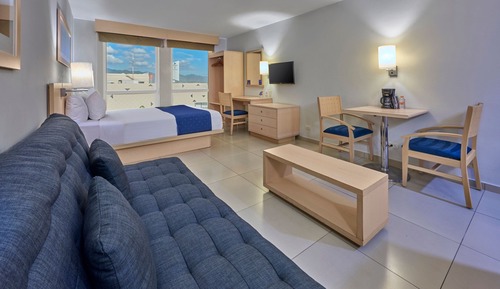 Suite, 1 cama de matrimonio con sofá cama