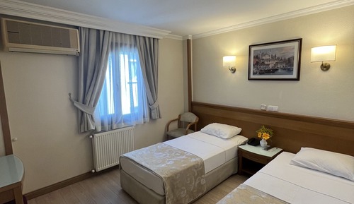 Habitación estándar con 1 cama doble o 2 individuales