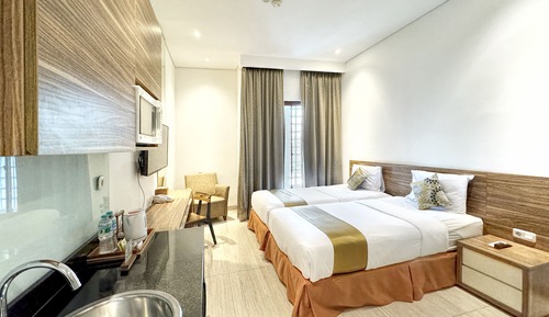Habitación Business con 1 cama doble o 2 individuales (Suite)