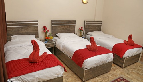 Habitación triple, vistas al mar