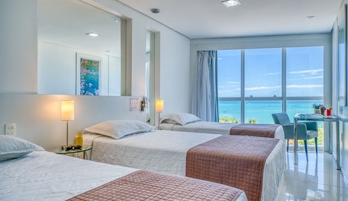 Premium Triplo Frente Mar