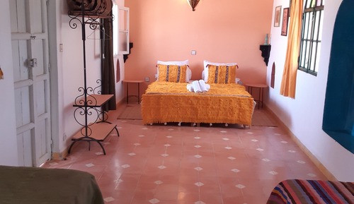Habitación cuádruple, vistas al jardín (Assilia)