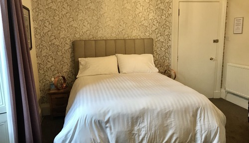 Habitación superior con 1 cama doble o 2 individuales