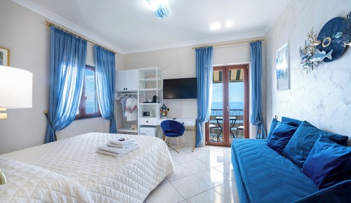 Habitación triple superior, vistas al mar