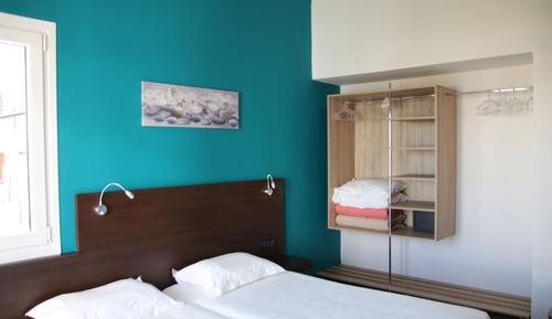 Habitación Confort con 1 cama doble o 2 individuales