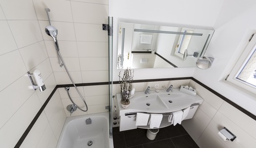 Habitación triple, varias camas