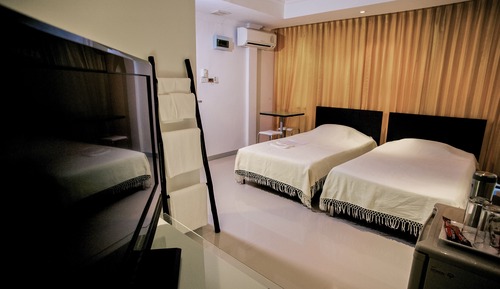 Habitación triple Deluxe