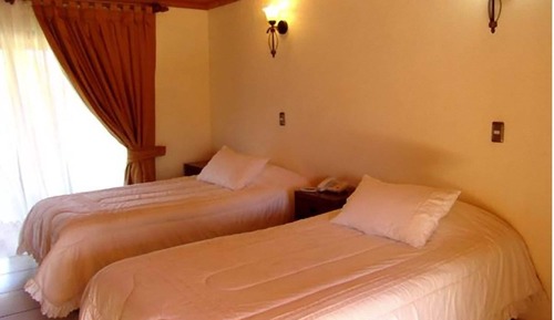 Habitación superior con 1 cama doble o 2 individuales