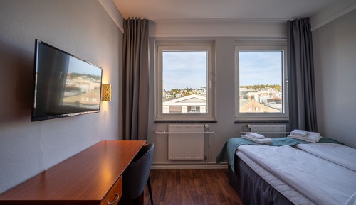 Habitación básica con 1 cama doble o 2 individuales