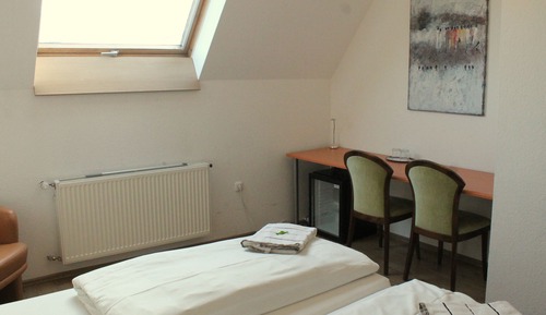 Habitación estándar con 1 cama doble o 2 individuales