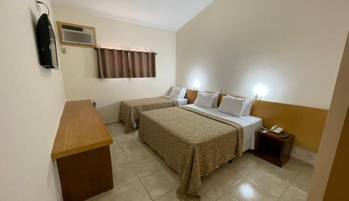Habitación triple económica, varias camas