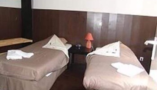Estudio Grand, 2 camas individuales