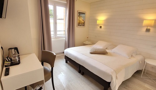 Habitación Confort con 1 cama doble o 2 individuales