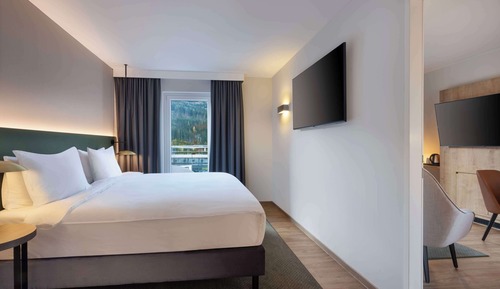 Habitación Deluxe, 1 cama de matrimonio grande con sofá cama, en esquina