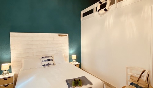 Suite superior, cocina básica, vistas al jardín