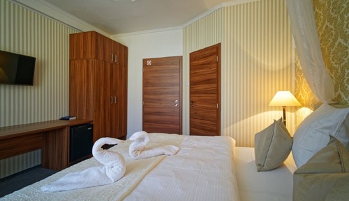 Habitación Confort con 1 cama doble o 2 individuales