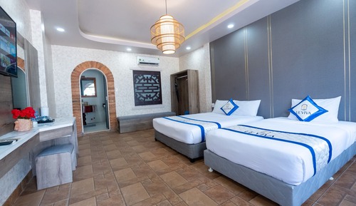 Habitación triple Deluxe, vistas al jardín