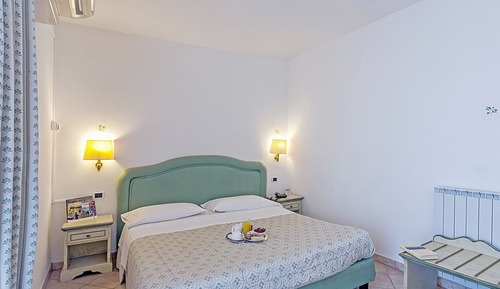 Habitación estándar con 1 cama doble o 2 individuales