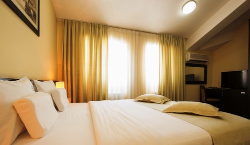 Habitación Confort con 1 cama doble o 2 individuales