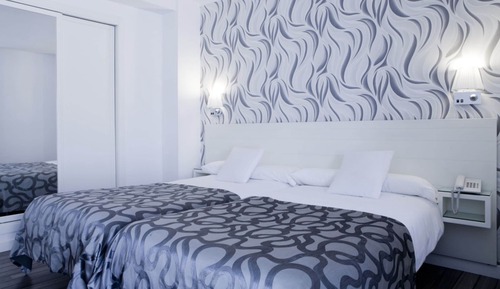 Habitación estándar con 1 cama doble o 2 individuales