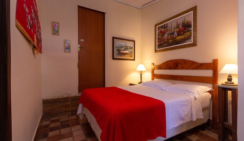 Habitación triple económica, varias camas
