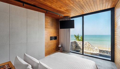 Suite villa con piscina, frente a la playa