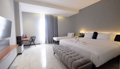 Habitación triple Deluxe