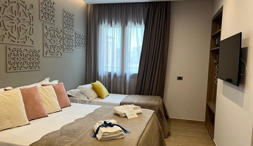 Habitación cuádruple Deluxe (106)