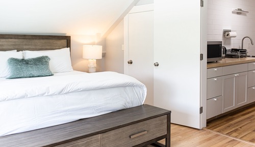 Suite Deluxe, 1 cama de matrimonio grande con sofá cama, cocina básica, vistas a la montaña