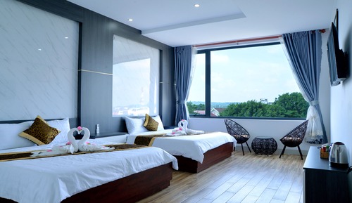 Habitación cuádruple Deluxe