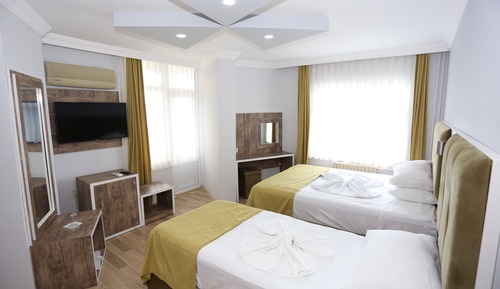 Habitación triple Deluxe, vistas al mar