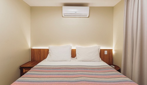 Habitación estándar con 1 cama doble o 2 individuales, vistas al jardín