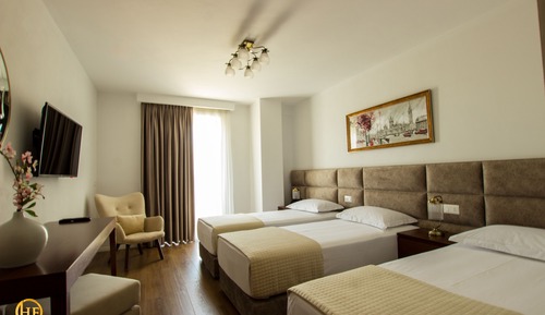 Habitación triple Deluxe