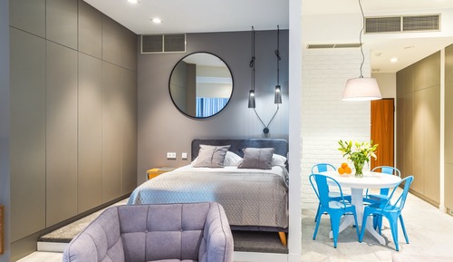 Suite estudio exclusiva, 1 cama de matrimonio, vistas a la ciudad, en una planta alta