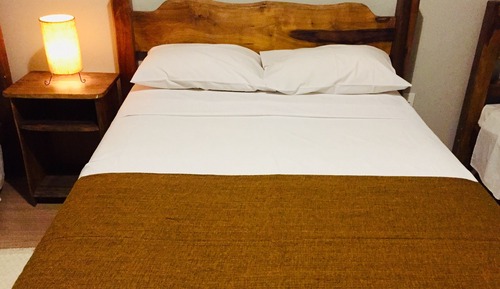 Habitación cuádruple, varias camas