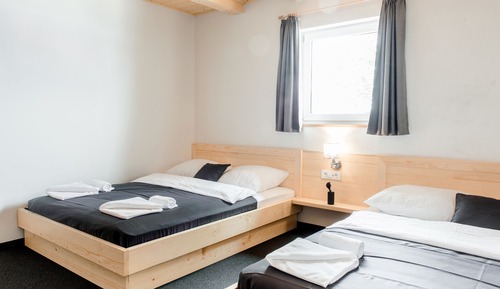 Habitación doble, varias camas