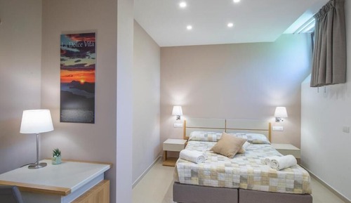 Habitación estándar con 1 cama doble o 2 individuales