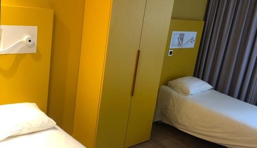 Habitación triple, varias camas