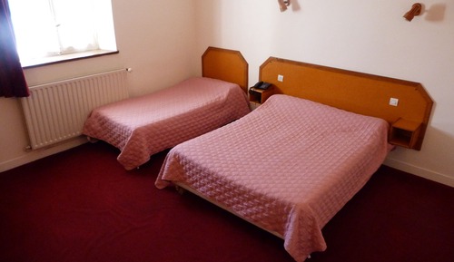 Habitación triple, bañera
