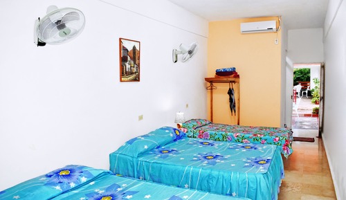 Habitación cuádruple familiar, vistas al jardín